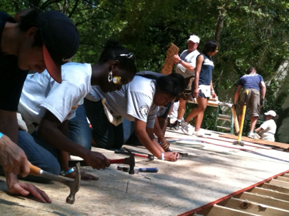 Jackson State University ARM members assist with building a Habitat for Humanity house for a family